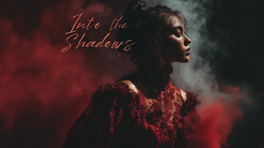 Mysterious woman in red lace gothic dress with “Into the Shadows” text overlay, symbolizing erotic fantasy and forbidden desire